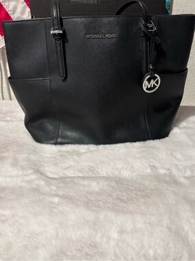 Michael Kors Black Leather Tote with MK Pendant